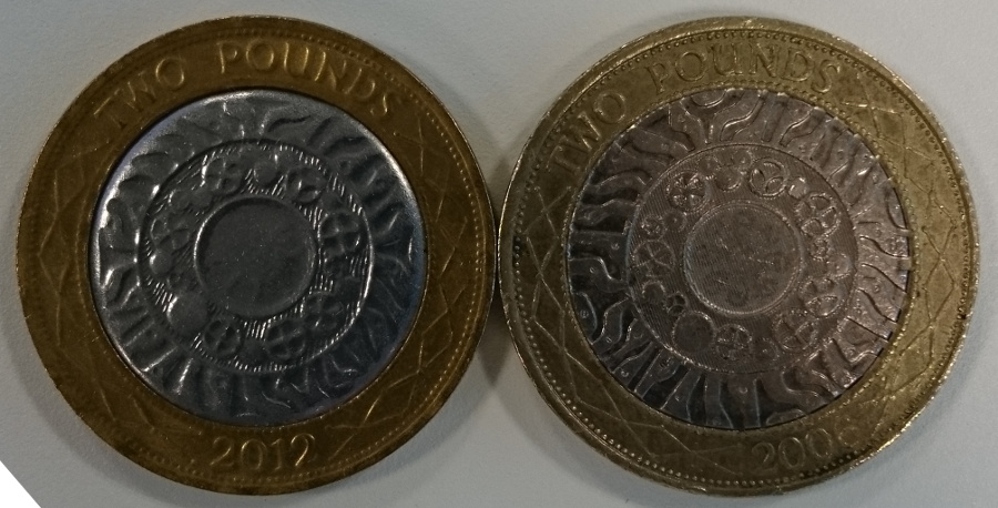 Reverse of real and fake coin, side by side